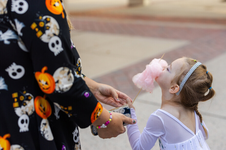 Attendees participating in fun activities at the Fall Fest.
