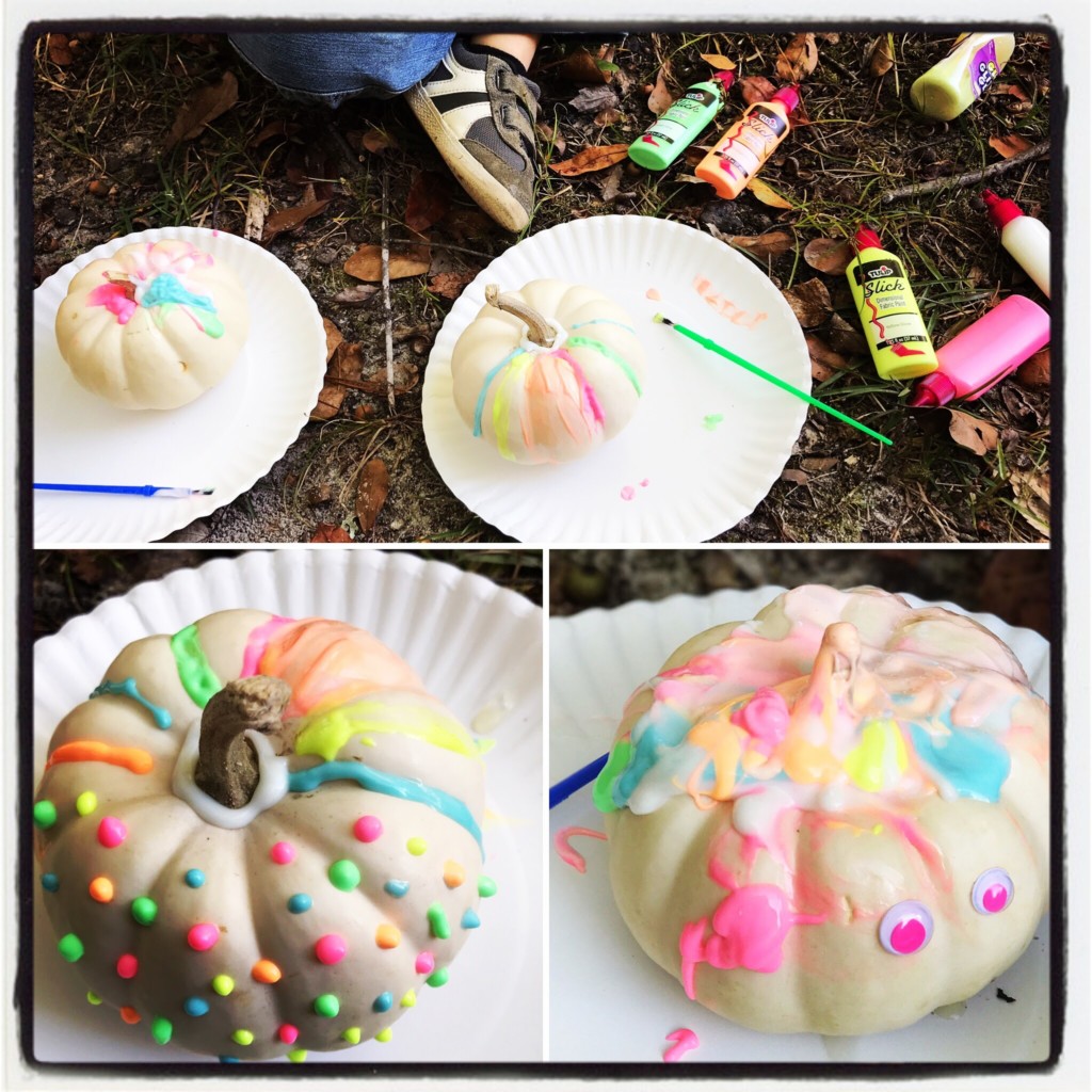 Painted pumpkins on display at a fall festival — a colorful no-carve option.