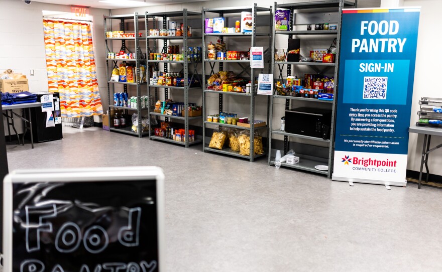 Volunteers organizing food at Brightpoint’s pantry — an example of local support available to Midlothian families.